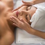 asian young beauty woman relaxing with beaty facial and skin treatment therapy in spa salon